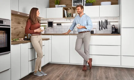 Küche mit angepasster Arbeitshöhe für optimale Ergonomie – unterschiedliche Aktivhöhen für jedermann.